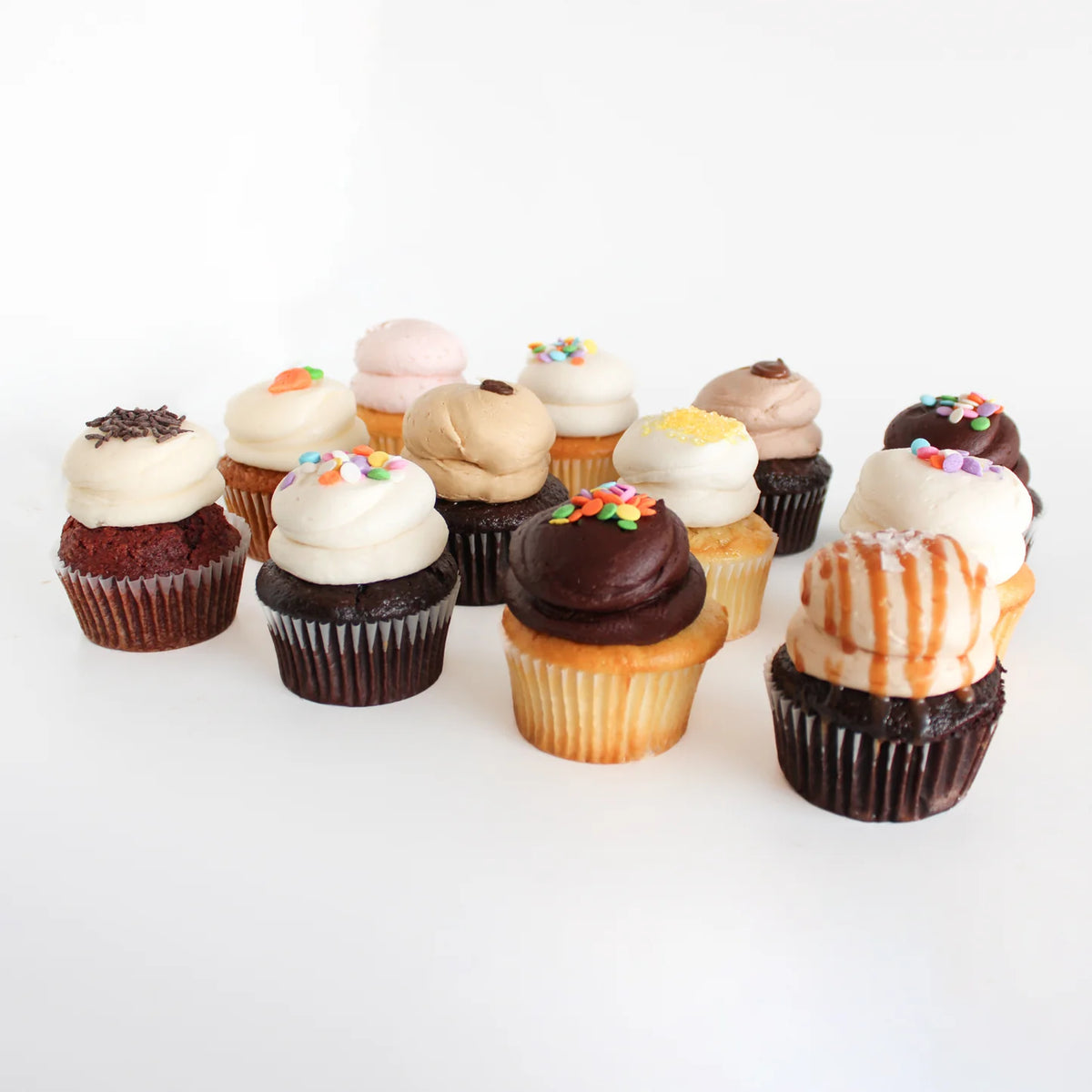 Assorted large Bake Sale Toronto cupcakes arranged together for a celebration